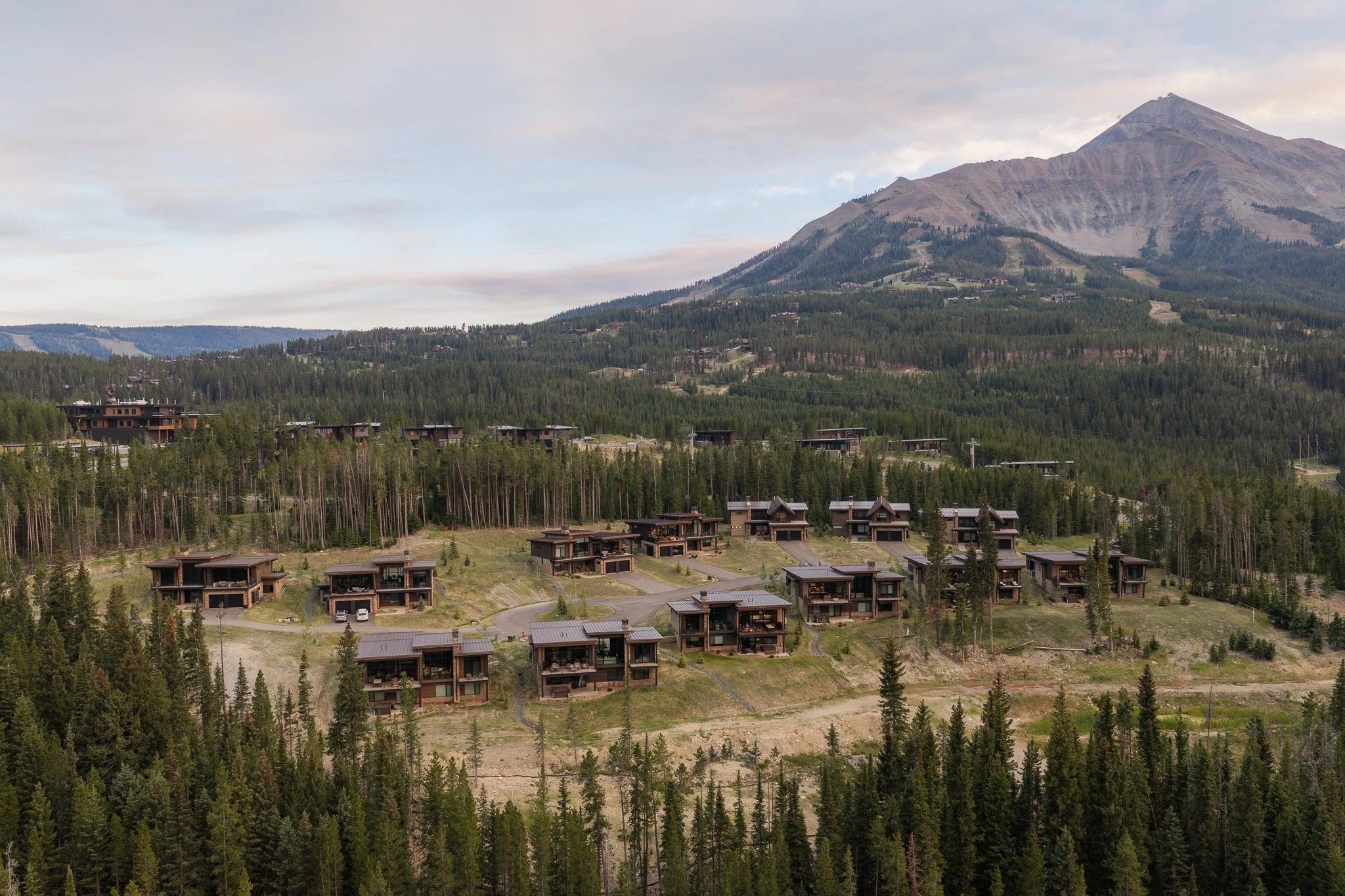 Aerial view of Moonlight Basin at dusk — architectural photography Big Sky Montana, Speedwell Cabin